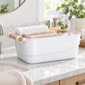 Bathroom storage basket organising toiletries and skincare products
